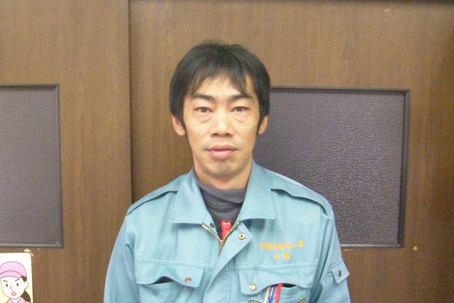 手塚 一雄